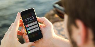 New Jersey may explore banning gambling push notifications A person looking at his phone screen as it displays several new notifications