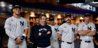 New York regulator will consider banning some bets, calls on leagues Aaron Judge and other New York Yankees players and staff in the locker room