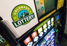 A Colorado Lottery sign in a retail store