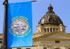 South Dakota Senate passes bill to put online sports betting to vote The South Dakota State Capitol building with a state flag in the foreground
