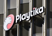 The Playtika logo and name on a headquarters building