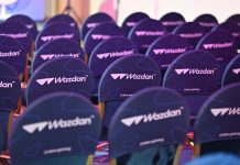 Chairs at an SBC event bearing the logo of Wazdan