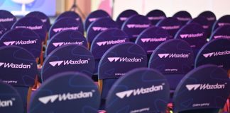 Wazdan continues West Virginia momentum with Fanatics Casino link-up Chairs at an SBC event bearing the logo of Wazdan