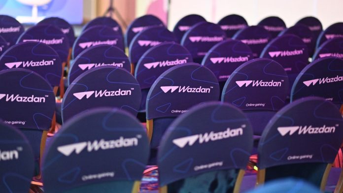 Wazdan-continues-West-Virginia-momentum-with-Fanatics-Casino-link-up Chairs at an SBC event bearing the logo of Wazdan
