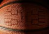 March Madness ball as the AGA projects Americans to wager $3.3 billion on the tournament.