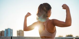 A woman flexing as DraftKings debuts a new Flex Spin feature for online casino players.