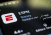 The ESPN app downloading on a phon