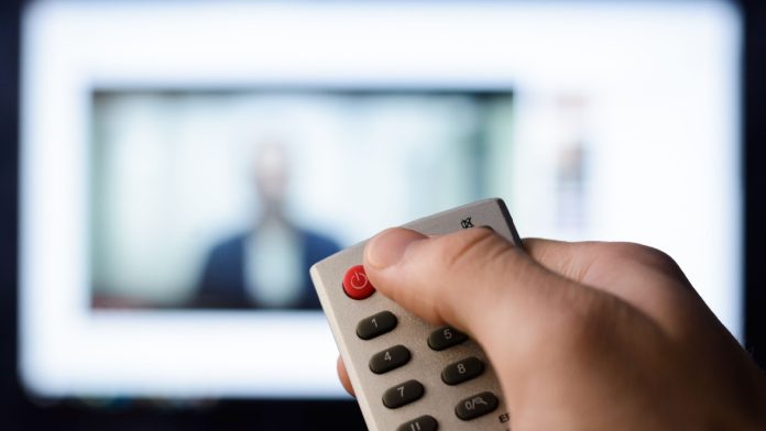 FanDuel-TV-Turn-Off-Close-Operations A person turning the TV off as FanDuel TV is set to shutter.