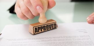 An approval stamp as Fanatics Markets and Splash Sports receive NFA approval.