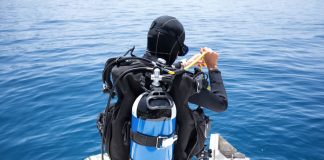 A deep-sea diver preparing to dive