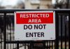 Indiana formally bans sweepstakes casinos as Gov. Braun signs bill A "restricted area" sign on a gate