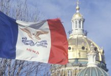 Kalshi sues Iowa officials as state mulls regulating prediction markets The Iowa flag flies in front of the State Capitol building