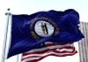 The Kentucky and the USA flags flying