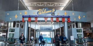 Signage at Harry Reid International Airport welcoming visitors to Las Vegas