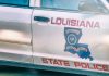 Louisiana police car as the state's House passes a bill that considers sweepstakes devices racketeering activity.