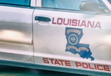 Louisiana police car as the state's House passes a bill that considers sweepstakes devices racketeering activity.