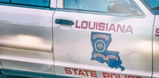 Louisiana police car as the state's House passes a bill that considers sweepstakes devices racketeering activity.