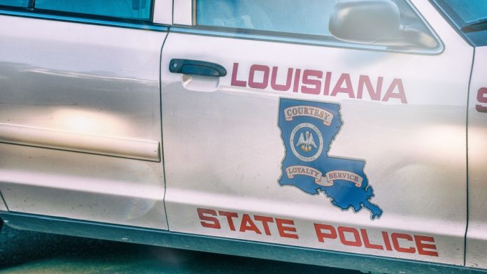 Louisiana police car as the state's House passes a bill that considers sweepstakes devices racketeering activity.