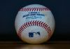 A baseball as MLB secures partnerships with Polymarket and the CFTC.