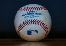 A baseball as MLB secures partnerships with Polymarket and the CFTC.
