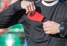 Soccer ref as MLS gives a lifetime ban to two players for gambling violations.