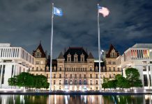A nighttime view of the New York State Capitol in Albany, NY