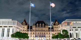 A nighttime view of the New York State Capitol in Albany, NY