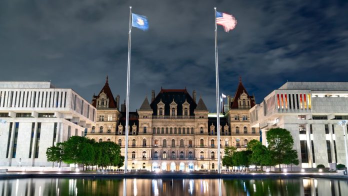 A nighttime view of the New York State Capitol in Albany, NY