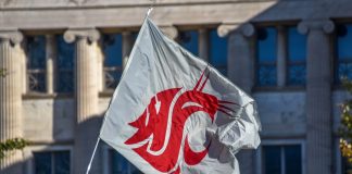 Washington State flag as the Pac-12 secures a partnership with Genius Sports.