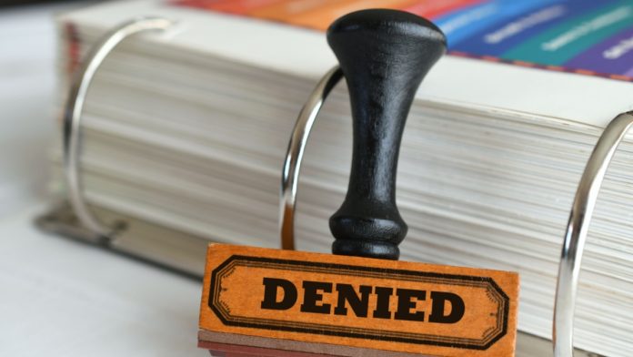 Polymarket-Michigan-Denied-TRO Denied stamp as Polymarket is denied a temporary restraining order in Michigan.