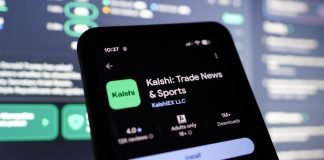 Someone downloading the Kalshi app