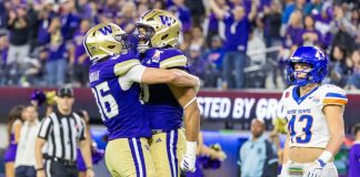 Washington football players as the state approves a bill to allow wagering on in-state colleges.