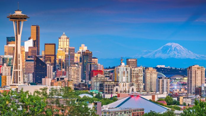 Washington-passes-bill-to-loosen-college-sports-betting-rules Seattle, Washington, downtown city skyline at dusk