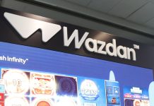 Wazdan continues US growth with FanDuel Casino partnership A Wazdan booth at an SBC event