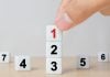 bet365 reveals states’ favorite online casino games A person ranking cubes as bet365 provides online casino game rankings.