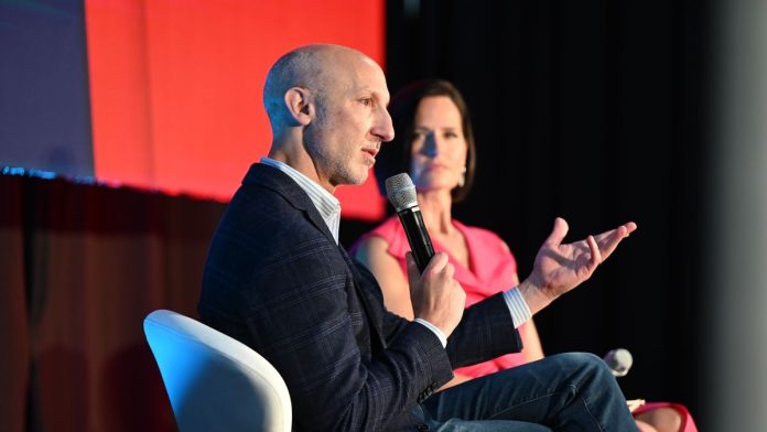BetMGM CEO Adam Greenblatt speaks at an SBC event
