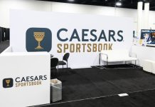 A Caesars Sportsbook booth at an SBC event