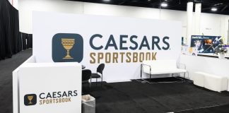 A Caesars Sportsbook booth at an SBC event