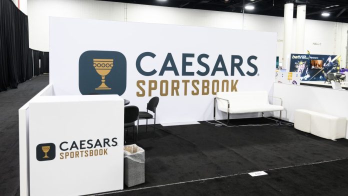 A Caesars Sportsbook booth at an SBC event