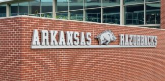 University of Arkansas sign as Catalist Sports enters the state, along with Nebraska.