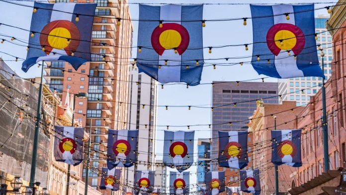Colorado flags flying in Denver, Colo.