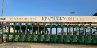 The starting gate for the Kentucky Derby stands ready on the track at Churchill Downs.