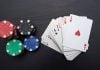 FanDuel officially launches 3-state PokerStars network Poker chips next to a deck of cards