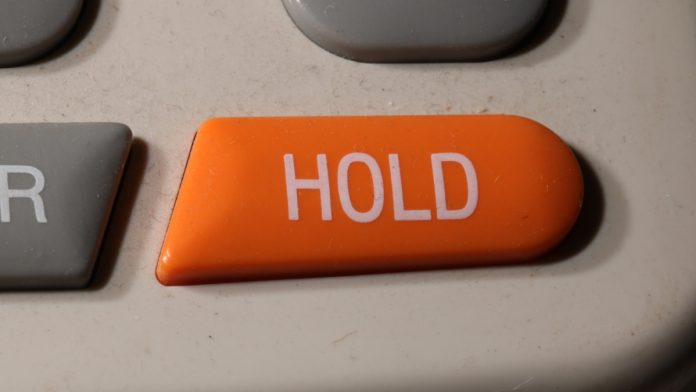 Illinois-Per-Wager-Tax-On-Hold-FanDuel Phone hold logo as FanDuel puts a temporary hold on its per-wager tax in Illinois.