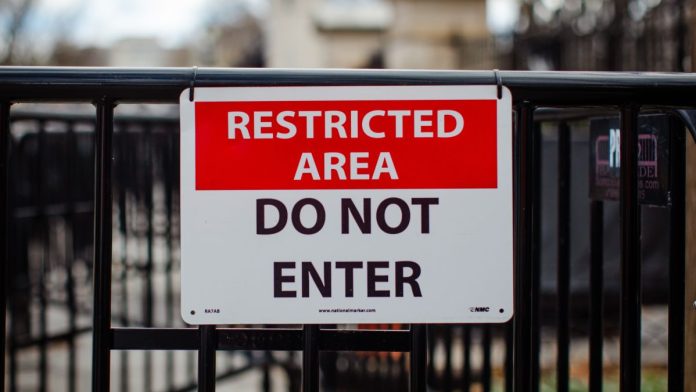 MGCBs-new-third-party-self-exclusion-tool-includes-prediction-markets A 'restricted area' sign on a fence