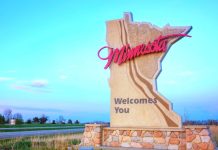 Minnesota welcome sign as lawmakers in the state discuss online sports betting.
