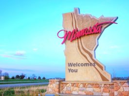 Minnesota welcome sign as lawmakers in the state discuss online sports betting.