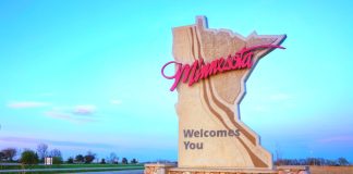 Minnesota welcome sign as lawmakers in the state discuss online sports betting.