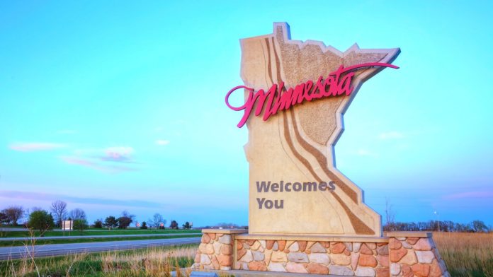 Minnesota welcome sign as lawmakers in the state discuss online sports betting.