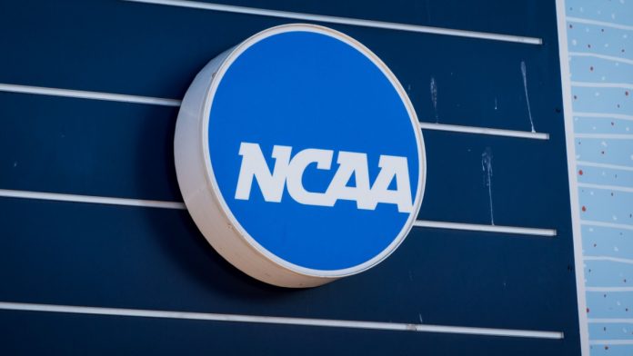 NCAA-Expedited-Trial-DraftKings-Suit NCAA logo as the organization makes a request in its suit against DraftKings.